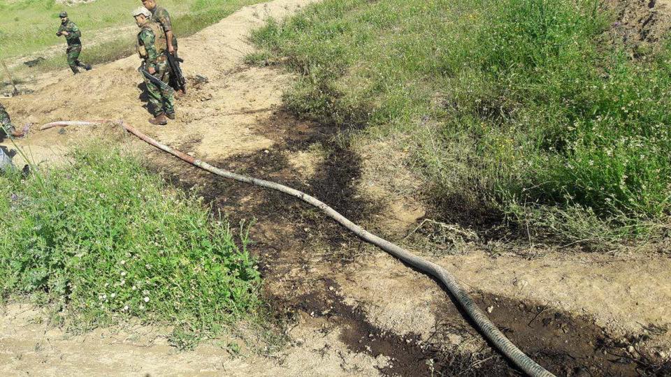 Police forces in Kirkuk confiscate two trucks in the site of an oil robbing, April 18, 2019. (Photo: Energy Police in Kirkuk)